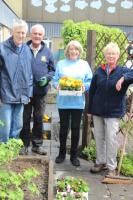 The gardeners relax for a minute!