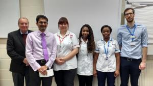 Elwira, Eugenie and Yvonne are nursing students at MK Hospital.  Here they are receiving their bursaries accompanied by the Director of Finance at the hospital.