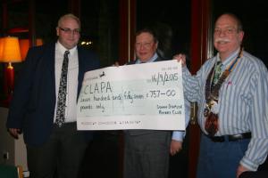 President Bruce presents cheque