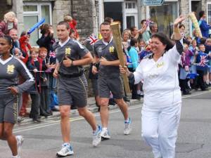 Emma willis carries the torch through Swanage