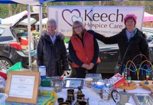 Carol Young and her fellow volunteers on the stall at Ampthill Market