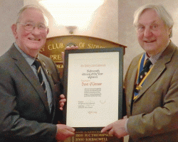 President Ron presents Dave O'Conner with his award