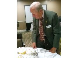 Clifford, eyeing up the cake as he celebrates his 94th birthday.