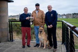 Tommy Brown (St A Rotary), Jim Gales (European Captain) with his guide dog Yannick, John Christie (St A Rotary president)