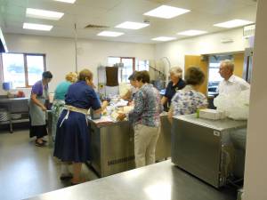 The kitchen gets busy in preparation for the 2014 Strawberry Tea in the Holsworthy Memorial Hall