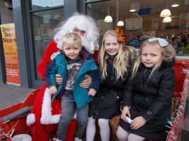 3 Children see Santa