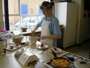 A Leftwich pupil hard at work in the kitchens