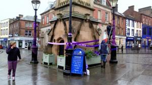 Volunteers Purpling Penrith in the pouring rain yesterday