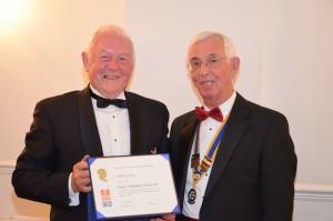 Colin receiving his PHF Certificate and badge from President John Walduck