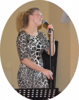 Emily Adams entertains at the Christmas Party (see more pictures in 