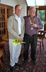 President Paul inducts his first Rotarian to the Club.