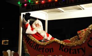 Father Christmas waving from the float.