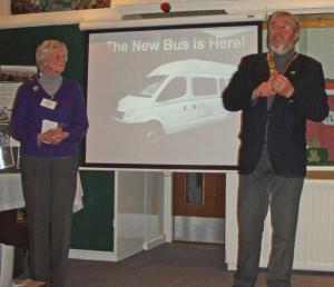 President David alongside photo of new minibus