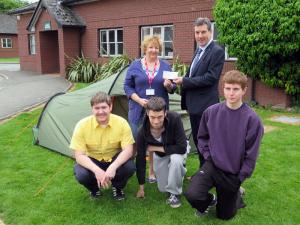 L-R back row: Rotarian Jayne Middleton and Andrew Harris, Deputy Principal of the Derwen College. Front row: Wesley MacIntyre, Matthew Taylor and George Raffle