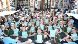 Whiteley Year six pupils showing their Dictionaries for Life