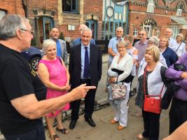 Ed Nicholls weavings his tales of ghostly happenings in Ipswich to a captivated audience of Wolseyites