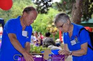 Kingston upon Thames Rotarians Paul & Christine voluteering at a Vaccine centre 