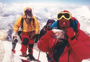 The main picture shows Alan on the summit of Mount Everest.