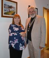 Fiona is seen here with President Ian Geddes