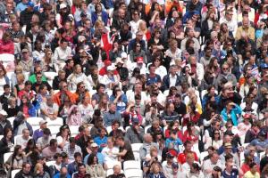A crowd of people in a sports stand