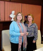 Fiona Hedger-Gourlay receiving the award from President Lousie Begbie