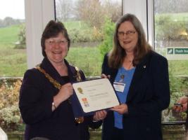 RIBI President Nan McCreadie, presents the PHF Award to Fiona Miles 
