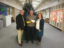 President Paul Brading making presentation of donation cheque