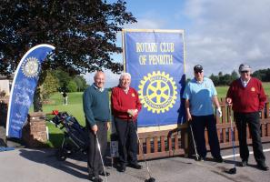 After yesterday's deluge and course closure, all is well for the annual fund raising golf event. Here, Rotary team David Harle, Malcolm Boyd Nick Capron and Alex Buchan pause on their way to the first tee. As it says on the flag New Members are Welco