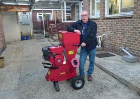 The two Godalming Rotary clubs recently bought a wood chipper for use in the gardens at Hydon Hill