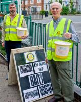 Rotary collecting for Haiti disaster relief