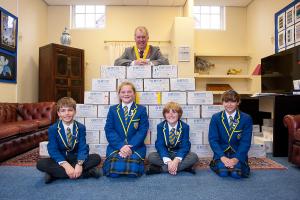 Halstead Rotary work with Pupils from St Margaret's School to fill Shoe Boxes 