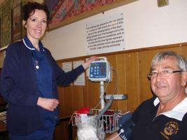 Maria Jones of Oswestry DAART (Diagnostic, Assessment & Access to Rehabilitation & Treatment) taking the blood pressure of Rotarian Mike Griffiths – the Rotary Club’s Community Service Chairman.