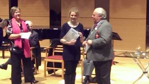 Emma Oulton receives her Certificate for second place