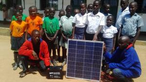 Students with the first solar panel 
