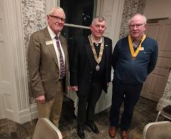 John Dunkley next to President Peter West and Vice President Mike Parks