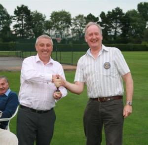 David Ellis as winning club president receiving the trophy from Michael Blakey president of Cambridge Rutherford winners in 2010