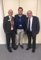 James (centre) with President John and fellow Rotarian Ray