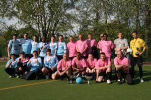 The runners up  and winning teams from Flack (blue) and Winter Comfort (pink) at the Abbey Leisure Complex after the trophy and medal presentations.