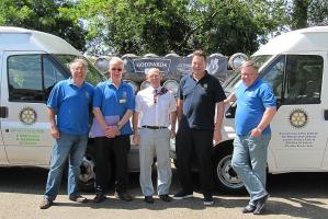 Ryde Rotarians present two minibuses to John's Club
