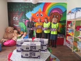President Phil presents to Janine Lewis from Sandy Bears