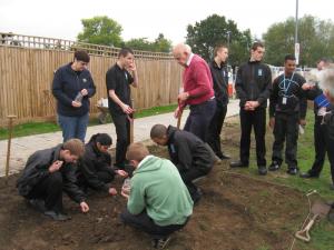 Uxbridge College students plant crocus bulbs