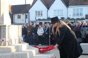 Cheryl laying the Wendover Rotary wreath.