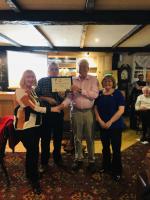 Chris Langeveld and Molly Jackson, Penkford School receiving the certificate for 1st Prize from Malcolm Greenhalgh and Phil Round, President