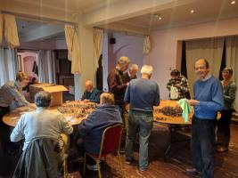 Stroud Rotarians cleaning glasses ready to ship to Sri Lanka. 