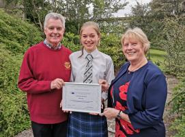 President John Stirling and Youth Activities Convenor Aileen North presented Kirsten with her Certificat Delivre