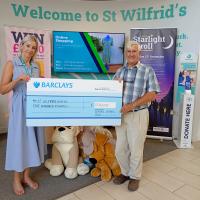 Immediate Past President Clive Livingstone presenting the President’s donation to Kayleigh Tippett from St Wilfrid's Hospice