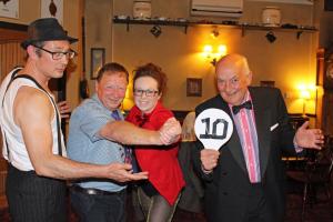 Picture shows Rotarian Kirsty putting Rotary President Gordon Steele through his paces.