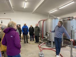 John Henderson talks to members in the packaging plant