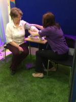 President Ros having her Blood Pressure checked by a member of the Stroke Association