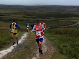 runners starting  hill to Greenhaw Hut